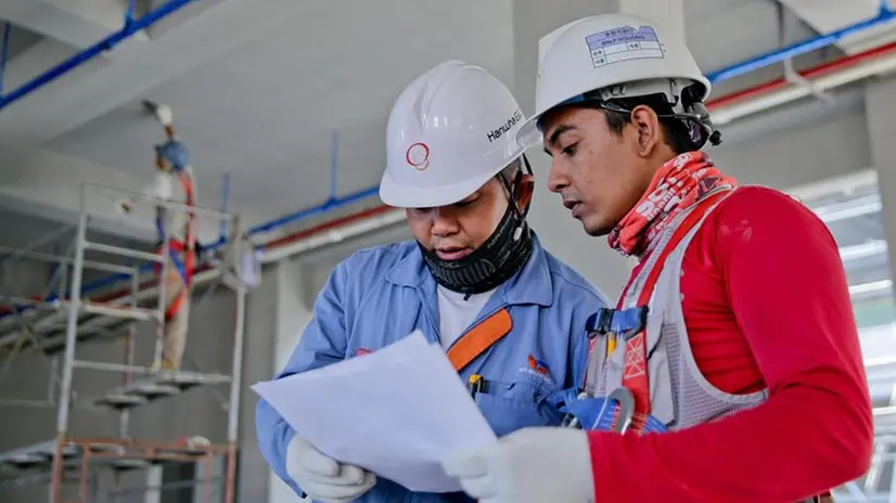 Due lavoratori stranieri