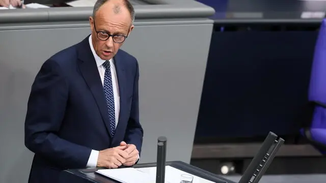 epa12098867 German Chancellor Friedrich Merz delivers a government statement during a session of the German parliament 'Bundestag' in Berlin, Germany, 14 May 2025. EPA/HANNIBAL HANSCHKE