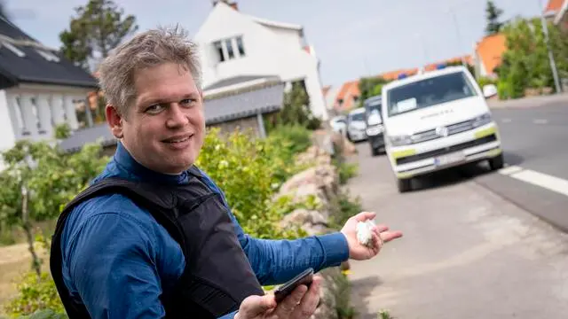 epa10692523 Far-right politician Rasmus Paludan stands outside the prohibition zone in Allinge on Bornholm, Denmark, 15 June 2023. Rasmus Paludan has been ordered by the Bornholm Police not to participate in the Folkemodet (a public meeting) and is therefore outside the prohibition zone a few hundred meters from the Folkemodet. Rasmus Paludan burned a copy of the Koran at a rally in Stockholm on 21 January, drawing worldwide condemnation. EPA/Ida Marie Odgaard