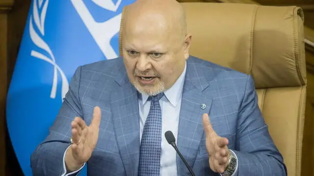 epa11294950 Prosecutor of the International Criminal Court (ICC), Karim Khan, speaks during a meeting with Attorney General of Venezuela, Tarek William Saab, and the President of the National Assembly, Jorge Rodriguez at the Federal Legislative Palace in Caracas, Venezuela, 22 April 2024. Khan is in the country to launch a joint work plan together with the High Court and the Venezuelan government. EPA/Miguel Gutierrez