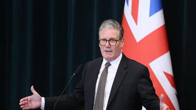 epa12102426 British Prime Minister Keir Starmer speaks during a joint press conference with Albania's Prime Minister Edi Rama (not pictured) following their meeting in Tirana, Albania, 15 May 2025. Starmer visits Albania to announce stronger joint measures against migrant smuggling, including enhanced intelligence sharing, forensic upgrades, and expanded regional cooperation. EPA/MALTON DIBRA