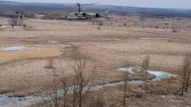 epa11255551 A handout still image taken from handout video provided 02 April 2024 by the Russian Defence ministry press-service shows Russian Ka-52 Alligator helicopters during an operation against Ukrainian troops in the Kupyansk direction, at an undislcosed location in Ukraine. Russian Defense Minister Sergei Shoigu said that Russian forces delivered 190 combined strikes and two major strikes on Ukrainian targets in March 2024. EPA/RUSSIAN DEFENCE MINISTRY PRESS HANDOUT HANDOUT EDITORIAL USE ONLY/NO SALES HANDOUT EDITORIAL USE ONLY/NO SALES HANDOUT EDITORIAL USE ONLY/NO SALES