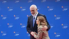 epa12105835 Albania's Prime Minister Edi Rama welcomes Italy's Prime Minister Giorgia Meloni at the 6th European Political Community (EPC) Summit in Tirana, Albania, 16 May 2025. The meeting brings together leaders from across the continent under the theme 'New Europe in a new world: unity - cooperation - joint action'. EPA/MALTON DIBRA