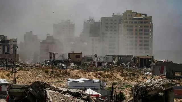 epa12106143 Smoke rises following an Israeli air strike near tents of Internally displaced Palestinians in the west of Gaza City on, 16 May 2025. More than 51,000 Palestinians have been killed in the Gaza Strip, according to the Palestinian Ministry of Health, since Israel launched a military campaign in the strip in response to a cross-border attack led by the Palestinian militant group Hamas on 07 October 2023, in which about 1,200 Israelis were killed and more than 250 taken hostage. EPA/MOHAMMED SABER