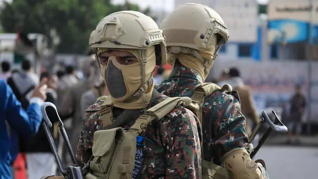epaselect epa12087689 Houthi soldiers patrol a street in Sana'a, Yemen, 09 May 2025. Yemen's Houthis claimed to have launched a hypersonic missile at Israel’s Ben Gurion Airport and a drone strike on Tel Aviv, as part of efforts to enforce an air blockade in response to Israeli attacks on Gaza, Houthi military spokesman Yahya Sarea said. EPA/YAHYA ARHAB