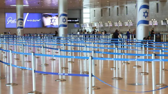 epa11579204 Passengers walk by an empty waiting area at the Ben Gurion International Airport after Israeli trade unionist and chairman of Histadrut, Arnon Bar-David, announced a general strike; in Tel Aviv, Israel, 02 September 2024. Israel's largest labor union, Histadrut, called for a nationwide general strike to start on 02 September urging the Israeli Prime Minister to reach a deal to secure the remaining hostages held by Hamas following the 07 October attack. Thousands of Israelis protested across Israel on 01 September following the recovery of the bodies of six hostagres held by Hamas in the Gaza Strip. According to a statement by the Israeli Government Press Office, 97 Israeli hostages remain in captivity in the Gaza Strip, with 33 confirmed dead. EPA/ABIR SULTAN