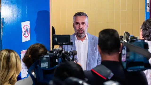 epa12112674 The secretary-general of the Socialist Party (PS), Pedro Nuno Santos, waits to cast his ballot in a polling station for the general elections in Lisbon, Portugal, 18 May 2025. Portugal holds early parliamentary elections on 18 May 2025, where over 10.8 million voters will choose from 20 political parties to fill the 230 seats in the Assembly of the Republic. EPA/JOSE SENA GOULAO