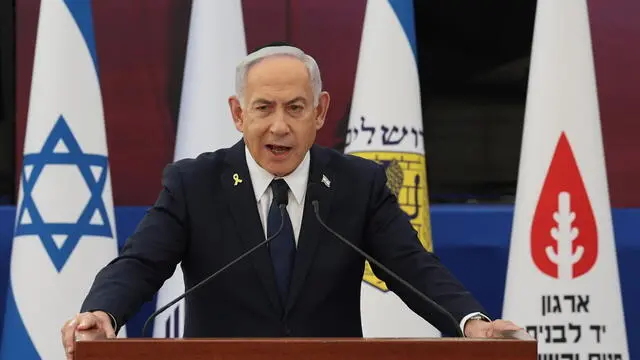 epa12062497 Israeli Prime Minister Benjamin Netanyahu speaks during the annual ceremony on the eve of the 'Memorial Day for the Fallen Soldiers of Israel and Victims of Terrorism' (Yom HaZikaron) at the Yad LaBanim Memorial in Jerusalem, 29 April 2025. EPA/ABIR SULTAN / POOL