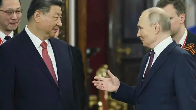 epa12082651 Russian President Vladimir Putin (R) and China's President Xi Jinping (L) attend their meeting at the Kremlin in Moscow, Russia, 08 May 2025. Russia will mark the 80th anniversary of the victory in World War II over Nazi Germany and its allies on 09 May. EPA/YURI KOCHETKOV / POOL