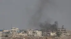 epa12115730 Smoke rises from ruined buildings in the Gaza Strip, as seen near the border with the Gaza Strip, southern Israel, 19 May 2025. The Israeli Defense Force has announced the launch of broad operations on Gaza Strip called 'Operation Gideon's Chariots', aimed to put pressure on Hamas to release the remaining Israeli hostages. Fifty-eight Israeli hostages remain in captivity EPA/ABIR SULTAN