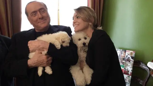 Silvio Berlusconi e Francesca Pascale con i cani Dudu e Dudina, a Milano, 01 giugno 2014. ANSA/Michela Brambilla-circolodellaliberta- EDITORIAL USE ONLY