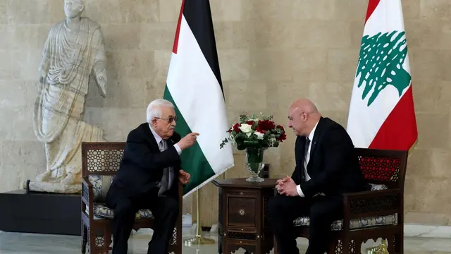 epa12122777 Lebanese President Joseph Aoun (R) and Palestinian President Mahmoud Abbas (L) meet at the presidential palace in Baabda, near Beirut, Lebanon, 21 May 2025. Abbas arrived in Beirut for a three-day official visit to meet with Lebanese officials, as well as discuss issues related to the Palestinian refugee camps. EPA/WAEL HAMZEH