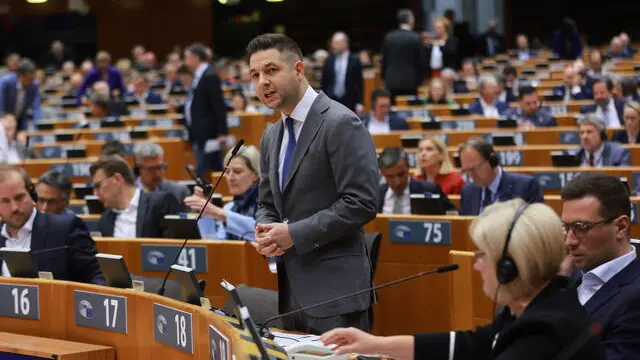 epa12125213 Member of Parliament from Poland Patryk Jaki (C) of European Conservatives and Reformists Group attends an EU Parliament session in Brussels, Belgium, 22 May 2025. The European Parliament's plenary session in Brussels runs from 21 to 22 May 2025. EPA/OLIVIER HOSLET