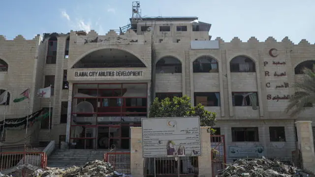 epa11268006 A destroyed hospital of the Palestinian Red Crescent Society as Palestinians return to Khan Younis after the Israeli military pulled out troops from the southern Gaza Strip, leaving just one brigade in the area, 09 April 2024. More than 35,000 Palestinians and at least 1,330 Israelis have been killed, according to the Palestinian Health Ministry and the Israel Defense Forces (IDF), since Hamas militants launched an attack against Israel from the Gaza Strip on 07 October 2023, and the Israeli operations in Gaza and the West Bank which followed it. EPA/MOHAMMED SABER