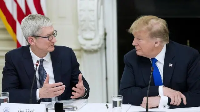epa07418339 Chief Executive Officer of Apple Inc. Tim Cook (L) and US President Donald J. Trump (R) participate in an American Workforce Policy Advisory Board meeting in the State Dining Room of the White House in Washington, DC, USA, 06 March 2019. The twenty-five-member American Workforce Policy Advisory Board aims to improve the prospects of the future US workforce. EPA/MICHAEL REYNOLDS