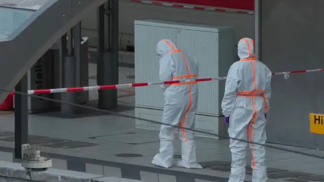 epa12129302 Forensic experts inspect the scene at the central station in Hamburg, Germany, 23 May 2025, following a knife attack at the station that left several people wounded, some critically according to police. The assailant was a 39-year-old woman the police said. EPA/NEWS5 / RENE SCHROEDER GERMANY OUT