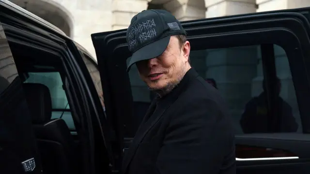 epa12124227 Businessman Elon Musk and his son X Ã† leave the US Capitol, Washington, DC, USA, 21 May 2025. Musk was meeting with lawmakers at the US Senate. EPA/WILL OLIVER