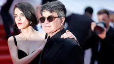 epa12131261 Solmaz Panahi (L) and director Jafar Panahi pose on the red carpet before the closing and awards ceremony of the 78th annual Cannes Film Festival, in Cannes, France, 24 May 2025. The film festival runs from 13 to 24 May 2025. EPA/GUILLAUME HORCAJUELO