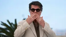 epa12121355 Director Jafar Panahi attends the photocall for 'Un Simple Accident' during the 78th annual Cannes Film Festival, in Cannes, France, 21 May 2025. The film festival runs from 13 to 24 May 2025. EPA/CLEMENS BILAN