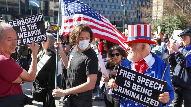 epa12037743 A person dressed as Uncle Sam attends the National Day of Action for Higher Education rally at Foley Square in New York, New York, USA, 17 April 2025. The organizers oppose conservative politicians withholding funding to influence how institutions run their schools, such as a recent investigation of Harvard University for alleged noncompliance with civil rights law. EPA/SARAH YENESEL