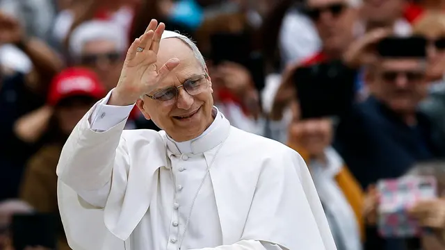 epa12122746 Pope Leone XIV during the weekly general audience in Saint Peters Square, Vatican City, 21 May 2025. EPA/ANGELO CARCONI