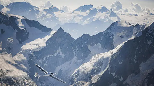 epa11487484 SolarStratos, a solar-powered aircraft prototype flown by Swiss adventurer Raphael Domjan, flies towards the Matterhorn mountain during a scouting and test flight near the village of Zermatt, Switzerland, 19 July 2024. Over the summer the team will try to reach an altitude of 10,000 meters, and later aim for the stratosphere. EPA/VALENTIN FLAURAUD