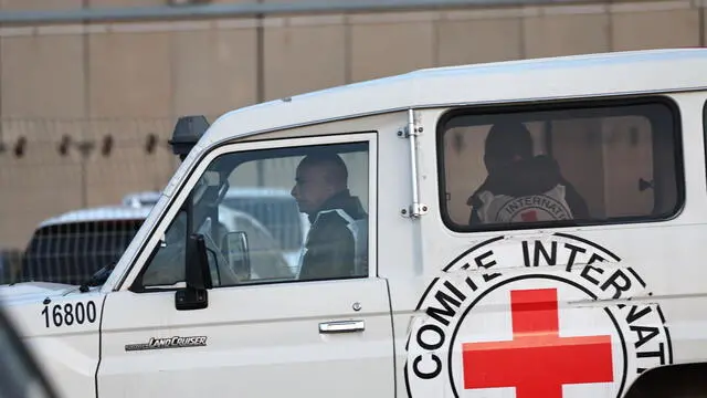 epa11836676 The International Committee of the Red Cross (ICRC) arrives to the West Bank military prison of Ofer, north of Jerusalem, to move the Palestinian prisoners that are expected to be released in the Israel-Hamas release deal 19 January 2025, amid a ceasefire between Israel and Hamas. Israel and Hamas agreed on a hostage release deal and a Gaza ceasefire to be implemented on 19 January 2025. More than 46,000 Palestinians have been killed in the Gaza Strip, according to the Palestinian Ministry of Health, since Israel launched a military campaign in the strip in response to a cross-border attack led by the Palestinian militant group Hamas on 07 October 2023, in which about 1,200 Israelis were killed and more than 250 taken hostage. EPA/ATEF SAFADI