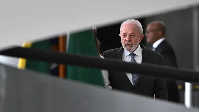 epa12129005 President of Brazil, Luiz Inacio Lula da Silva, walks out after receiving his counterpart from Angola, Joao Lourenco, at the Planalto Palace in Brasilia, Brazil, 23 May 2025. The Angolan president is on a state visit at a time when Brazil is considering strengthening cooperation with African countries to combat hunger and poverty. EPA/ANDRE BORGES