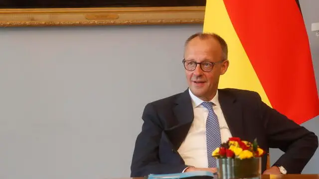 epa12124941 German Chancellor Friedrich Merz looks on during his meeting with Lithuanian President Gitanas Nauseda (not seen) in Vilnius, Lithuania, 22 May 2025. The two leaders discussed Lithuanian-German bilateral ties, defense cooperation, support for Ukraine and key items on the European Union agenda. Later, the German Chancellor will attend the Inauguration of the German 45th Armored Brigade 'Lithuania'. EPA/TOMS KALNINS