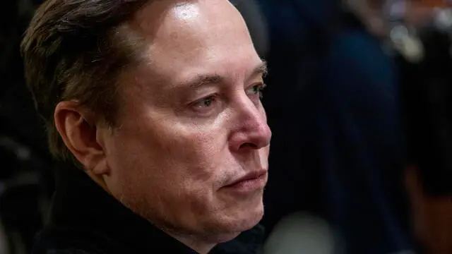epa12023485 Elon Musk, CEO of Tesla and senior advisor to US President Donald Trump, looks on during a Cabinet meeting in the Cabinet Room of the White House in Washington, DC, USA, 10 April 2025. EPA/SHAWN THEW / POOL