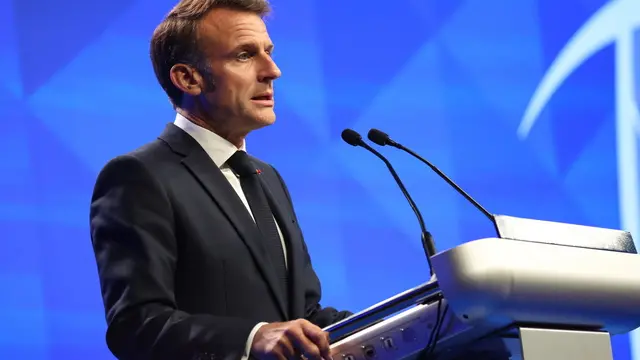epa12144989 French President Emmanuel Macron delivers his keynote address during the International Institute for Strategic Studies (IISS) Shangri-la Dialogue Defence Summit in Singapore, 30 May 2025. Defense ministers and officials from 47 countries are gathered in the city state for the IISS Shangri-la Dialogue, an annual high level defence summit in the Asia Pacific region. EPA/HOW HWEE YOUNG