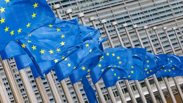 epa12046760 EU flags fly at half-mast in front of the European Commission headquarters, one day after the death of Pope Francis, in Brussels, Belgium, 22 April 2025. Pope Francis died on 21 April 2025 at the age of 88, according to the Holy See. EPA/OLIVIER MATTHYS