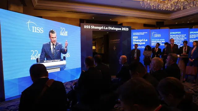 epaselect epa12146413 US Defence Secretary Pete Hegseth is seen on screen as he delivers his speech during the first plenary session of the International Institute for Strategic Studies (IISS) Shangri-la Dialogue Defence Summit in Singapore, 31 May 2025. Defense ministers and officials from 47 countries are gathered in the city state for the IISS Shangri-la Dialogue, an annual high level defence summit in the Asia Pacific region. EPA/HOW HWEE YOUNG