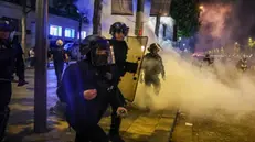 epa12148464 French police in action as clashes erupt with PSG fans celebrating on the Champs-Elysees after their team won the UEFA Champions League final between Paris Saint-Germain and Internazionale Milano, Paris, France, 31 May 2025. EPA/CHRISTOPHE PETIT TESSON