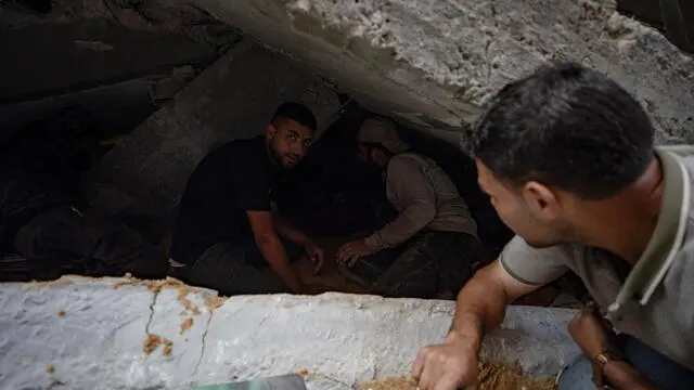 epa12127413 Palestinians search for the bodies of missing persons under the rubble of the Dardina family building, after it was hit by an Israeli airstrike in Jabalia, northern Gaza Strip, 23 May 2025, which killed more than 50 people. More than 53,700 Palestinians have been killed in the Gaza Strip, according to the Palestinian Ministry of Health, since Israel launched a military campaign in the strip in response to a cross-border attack led by the Palestinian militant group Hamas on 07 October 2023, in which about 1,200 Israelis were killed and more than 250 taken hostage. EPA/HAITHAM IMAD