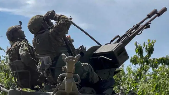 epa11427849 A still image taken from a handout video provided by the Russian Defence Ministry press service shows Russian servicemen of an anti-aircraft unit of the 'Center' group providing air cover for the positions of Russian motorized riflemen in the Avdeevka direction in the Russian-controlled part of Ukraine, Donetsk region, 21 June 2024. Throughout the night, Russian military personnel destroyed 114 Ukrainian aircraft-type drones over three regions, as well as six sea drones in the Black Sea, the Russian Defense Ministry said. EPA/RUSSIAN DEFENCE MINISTRY PRESS SERVICE/HANDOUT HANDOUT HANDOUT EDITORIAL USE ONLY/NO SALES HANDOUT EDITORIAL USE ONLY/NO SALES