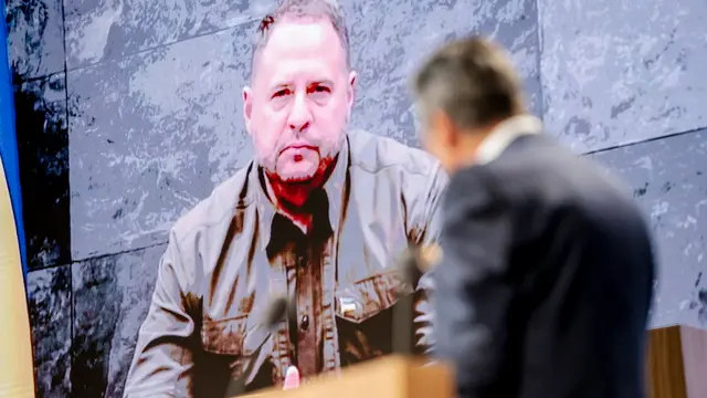 epa12095841 Head of the Office of the President of Ukraine, Andriy Yermak, appears on a screen as he speaks to former Prime Minister of Denmark and Secretary General of NATO Anders Fogh Rasmussen during the Copenhagen Democracy Summit, Copenhagen, Denmark, 13 May 2025. EPA/MADS CLAUS RASMUSSEN DENMARK OUT