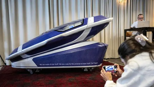epa11483290 The death capsule 'Sarco' developed by Exit International is presented during a press conference at Resilient Studios in Zurich, Switzerland, 17 July 2024. The Last Resort euthanasia organization officially presented the death capsule 'Sarco' in Zurich. The user of the device designed to enable assisted suicide can die in a matter of seconds by pressing a button that releases nitrogen, rapidly reducing oxygen levels, according to Exit International. EPA/ENNIO LEANZA
