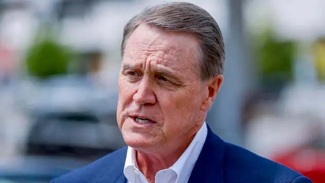 epa09909059 Georgia Republican gubernatorial candidate David Perdue participates in a campaign press conference about crime in the Buckhead district of Atlanta, Georgia, USA, 25 April 2022. Perdue, who is endorsed by former President Donald Trump, is running against incumbent Republican Governor Brian Kemp in a 24 May 2022 primary. EPA/ERIK S. LESSER