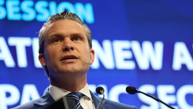 epa12146399 US Defence Secretary Pete Hegseth delivers his speech during the first plenary session of the International Institute for Strategic Studies (IISS) Shangri-la Dialogue Defence Summit in Singapore, 31 May 2025. Defense ministers and officials from 47 countries are gathered in the city state for the IISS Shangri-la Dialogue, an annual high level defence summit in the Asia Pacific region. EPA/HOW HWEE YOUNG