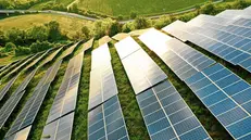 Solar panels fields on the green hills
