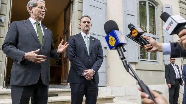 epa12092027 U.S. Secretary of the Treasury Scott Bessent (L) and U.S. Trade Representative Jamieson Greer (R) speak to the press after the second day of a bilateral meeting between the United States and China, in Geneva, Switzerland, 11 May 2025. EPA/MARTIAL TREZZINI