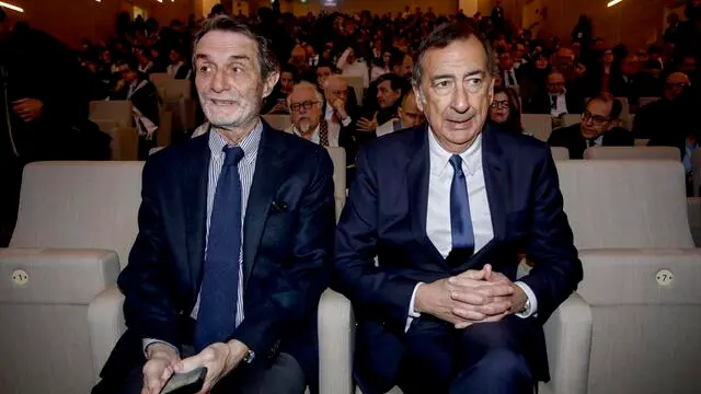 (da sx) Attilio Fontana e Giuseppe Sala durante la cerimonia di apertura dell'Anno Accademico 2023/2024 dell'Università IULM a Milano, 5 marzo 2024. ANSA/MOURAD BALTI TOUATI