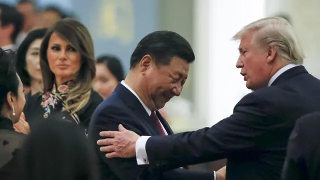 epa06317848 China's President Xi Jinping and China's first lady Peng Liyuan and US President Donald Trump and first lady Melania attend a state dinner at the Great Hall of the People in Beijing, China, 09 November 2017. US President Donald J. Trump is in China for a state visit from 08 to 10 November as part of his 12-day tour of Asia. EPA/THOMAS PETER / POOL