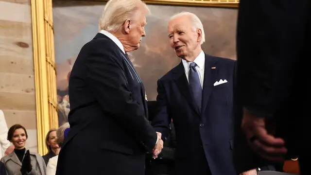 epa11839118 U.S. President-elect Donald Trump greets U.S. President Joe Biden as he arrives for inauguration ceremonies in the Rotunda of the U.S. Capitol on January 20, 2025 in Washington, DC. Donald Trump takes office for his second term as the 47th president of the United States. EPA/Chip Somodevilla / POOL