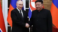 epaselect epa11421552 Russian President Vladimir Putin (L) shakes hands with North Korean leader Kim Jong Un (R) during their meeting in Pyongyang, North Korea, 19 June 2024. The Russian president is on a state visit to North Korea from 18-19 June at the invitation of the North Korean leader. He last visited North Korea in 2000, shortly after his first inauguration as president. EPA/GAVRIIL GRIGOROV / SPUTNIK / KREMLIN POOL MANDATORY CREDIT