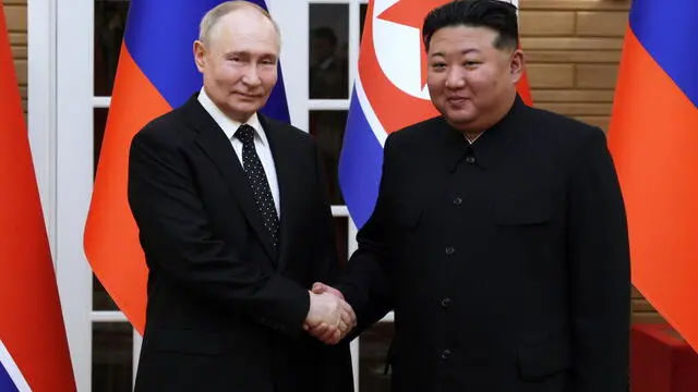 epaselect epa11421552 Russian President Vladimir Putin (L) shakes hands with North Korean leader Kim Jong Un (R) during their meeting in Pyongyang, North Korea, 19 June 2024. The Russian president is on a state visit to North Korea from 18-19 June at the invitation of the North Korean leader. He last visited North Korea in 2000, shortly after his first inauguration as president. EPA/GAVRIIL GRIGOROV / SPUTNIK / KREMLIN POOL MANDATORY CREDIT