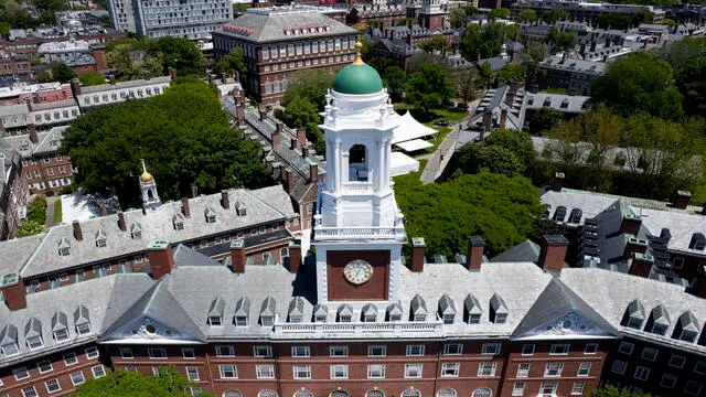 epa12139439 Harvard's Eliot House tower over the Harvard University campus in Cambridge, Massachusetts, USA, 27 May 2025. US President Trump has instructed all federal agencies to terminate all federal government contracts, estimated to be 100 million dollars (88.2 million euros) with Harvard and its affiliates. EPA/CJ GUNTHER