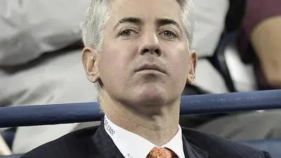 epa03851340 Pershing Square Capital Management CEO and founder Bill Ackman watches as Victoria Azarenka of Belarus plays Daniela Hantuchova of Slovakia during their quarterfinals round match on the tenth day of the 2013 US Open Tennis Championship at the USTA National Tennis Center in Flushing Meadows, New York, USA, 04 September 2013. The US Open runs through Monday 09 September, a 15-day schedule for the first time. EPA/ANDREW GOMBERT