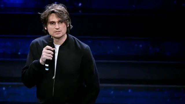 Italian stand up comedian Angelo Duro performs on stage at the Ariston theatre during the 73rd Sanremo Italian Song Festival, in Sanremo, Italy, 08 February 2023. The music festival will run from 07 to 11 February 2023. ANSA/RICCARDO ANTIMIANI